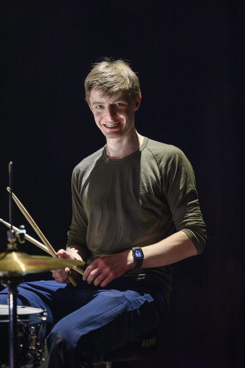 Archie Macfarlane playing drums