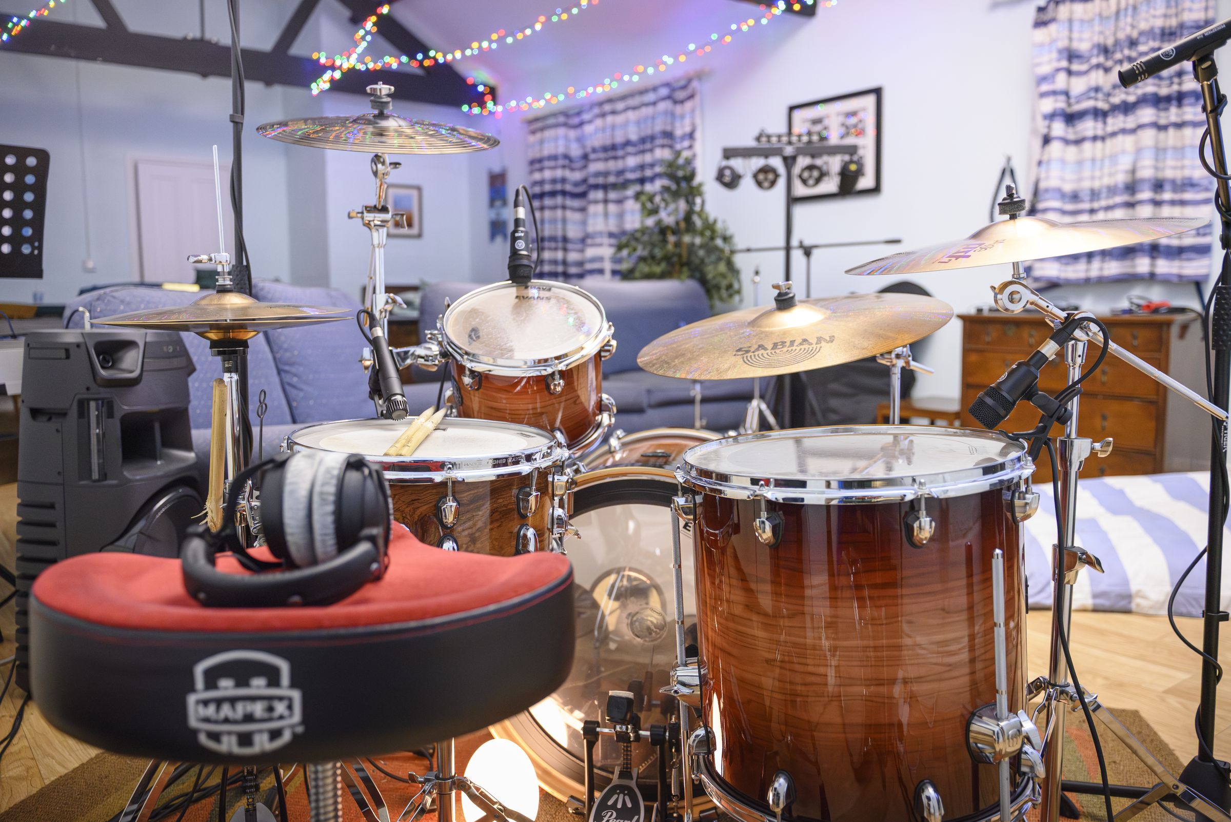 The drum kit set up in the home studio